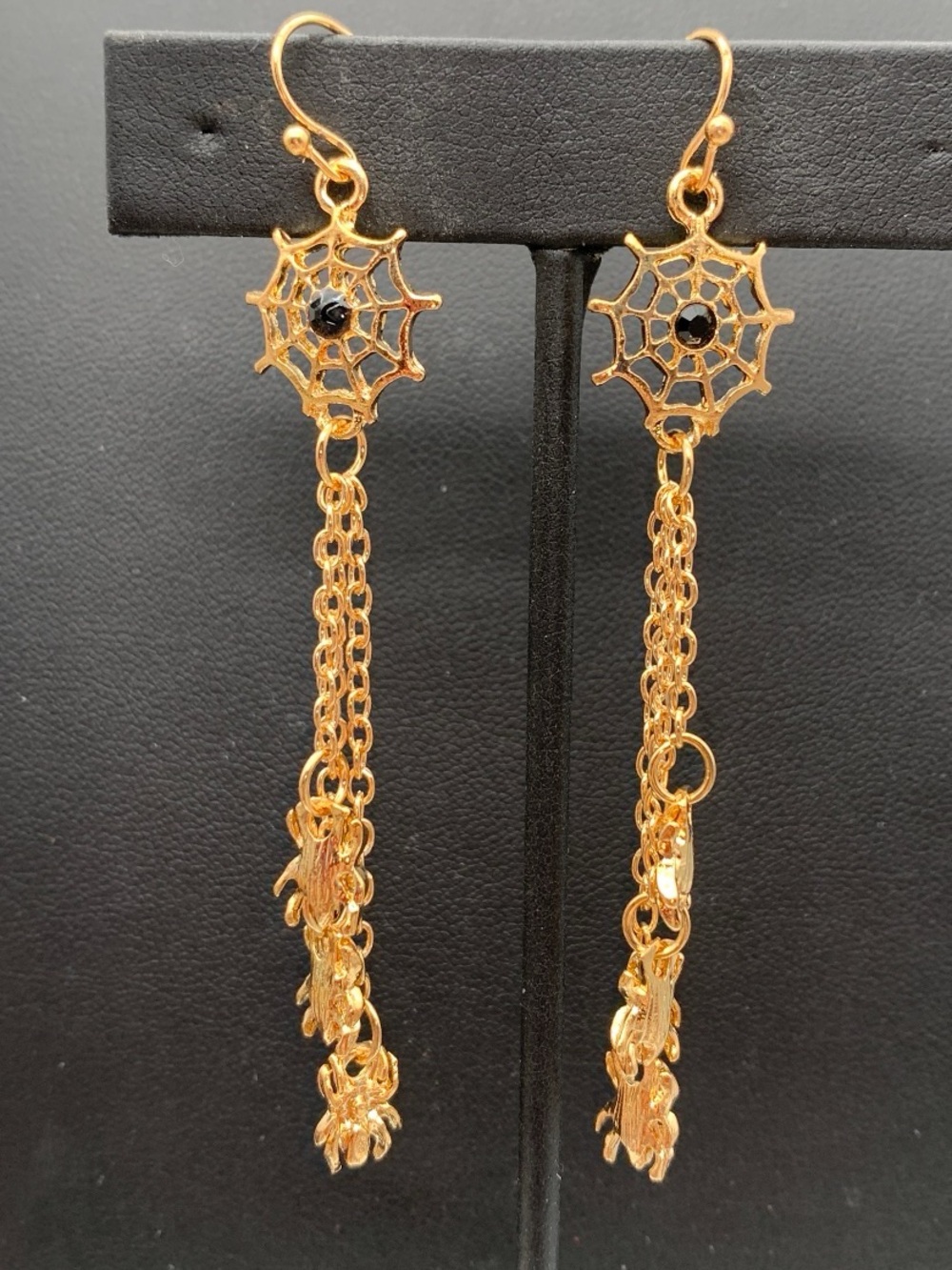 Gold tone Spider Web Drop Earrings with dangly spiders Black rhinestone